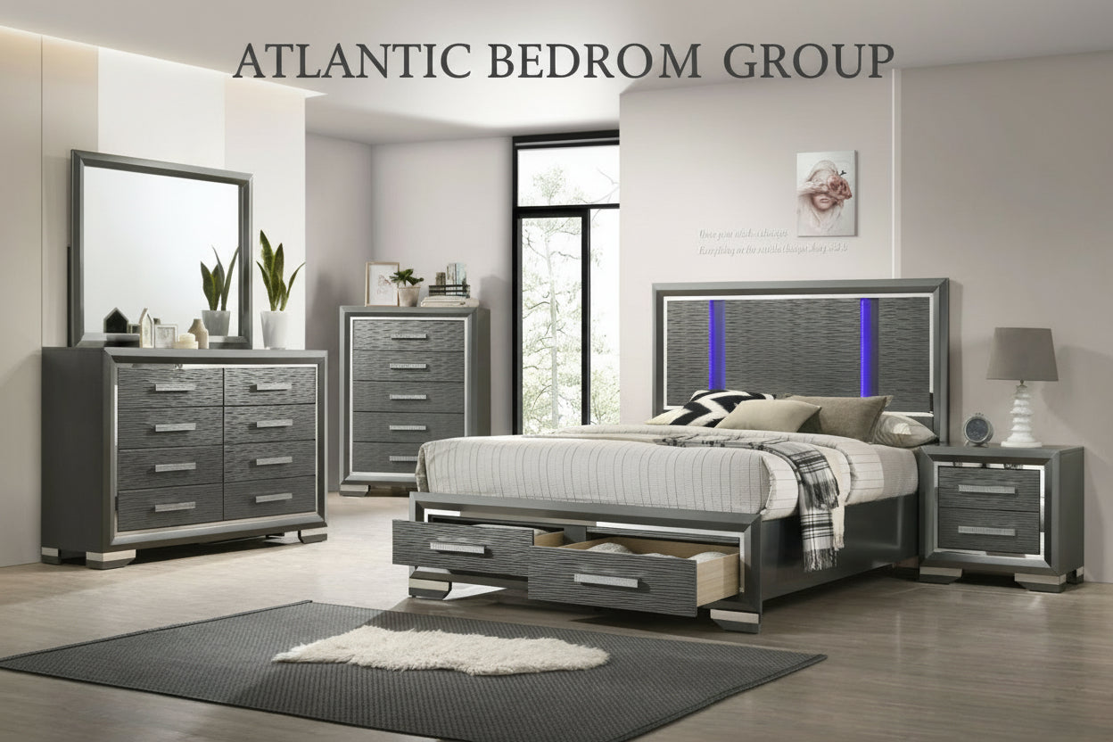 A bedroom set including a bed with a headboard featuring LED lights, a dresser with a mirror, and a nightstand, all in dark gray with chrome accents.
